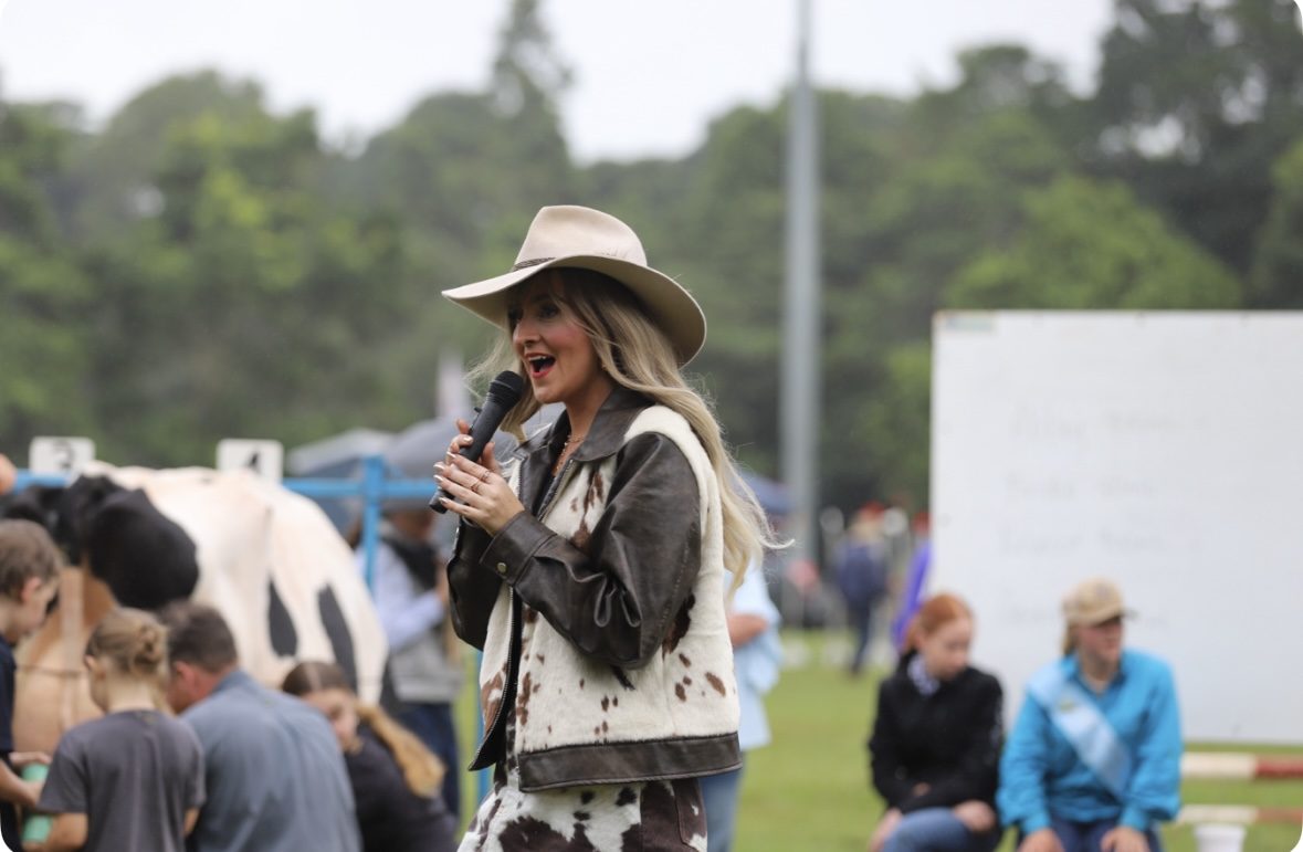 Georgina Humphries hosting the Celebrity Milking Competition